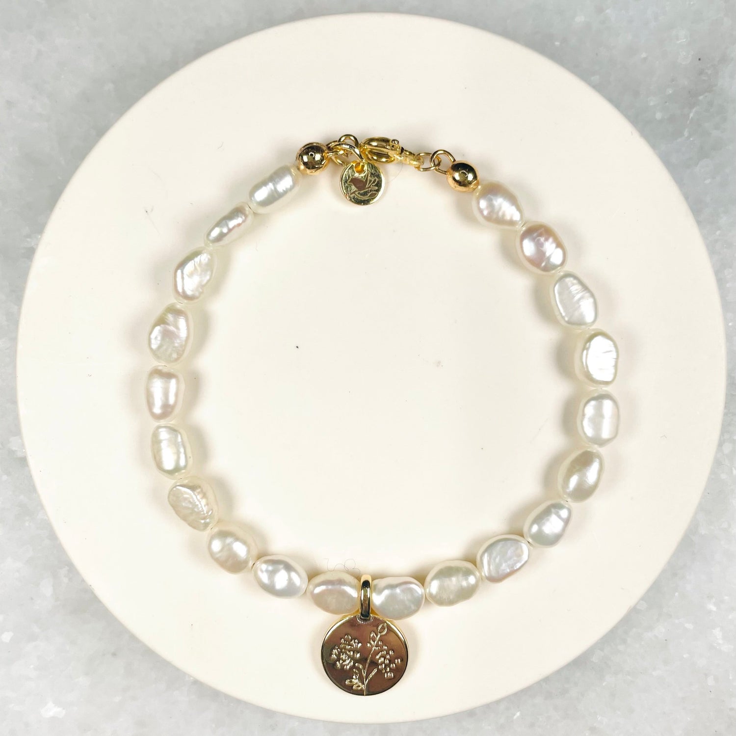 Medallion and freshwater pearl bracelet